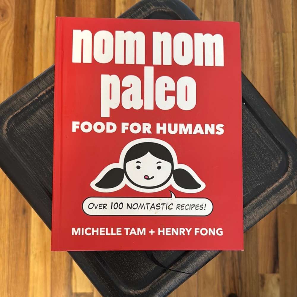 Nom Nom Paleo Cookbook, barely used. Excellent condition